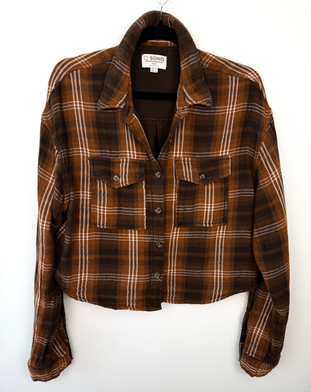 100% Cotton Ci Sono Cropped Plaid Shirt | Size M on hanger front. view