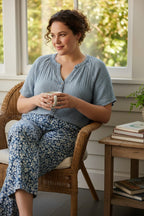 100% Cotton NWT Gauze Henley Top | Size 1X  at Blue Sparrow Shop on woman having tea wearing patterned pants