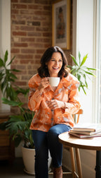 100% Cotton Parsley & Sage — Peach Abstract Floral Jacket, Size S at Blue Sparrow Shop Canadian Resale Reimagined  on woman drinking coffee