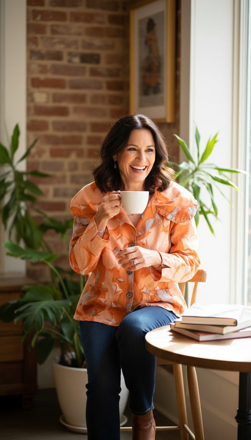 100% Cotton Parsley & Sage — Peach Abstract Floral Jacket, Size S at Blue Sparrow Shop Canadian Resale Reimagined  on woman drinking coffee