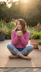 100% Cotton Reitmans  Pointelle Sweater in bubblegum pink at Blue Sparrow Shop - Canadian Resale Reimagined on woman outside drinking coffee