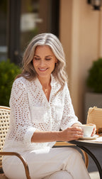 100% Cotton White Eyelet  Blouse | Size XL at Blue Sparrow Shop on woman at outdoor cafe