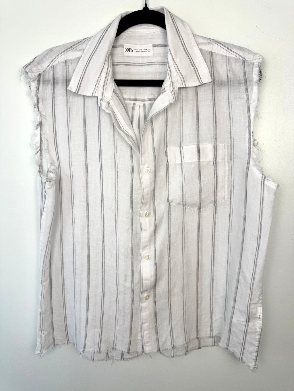 front of 100% Linen Zara Sleeveless Button Front Top | Size M at Blue Sparrow Shop  on hanger