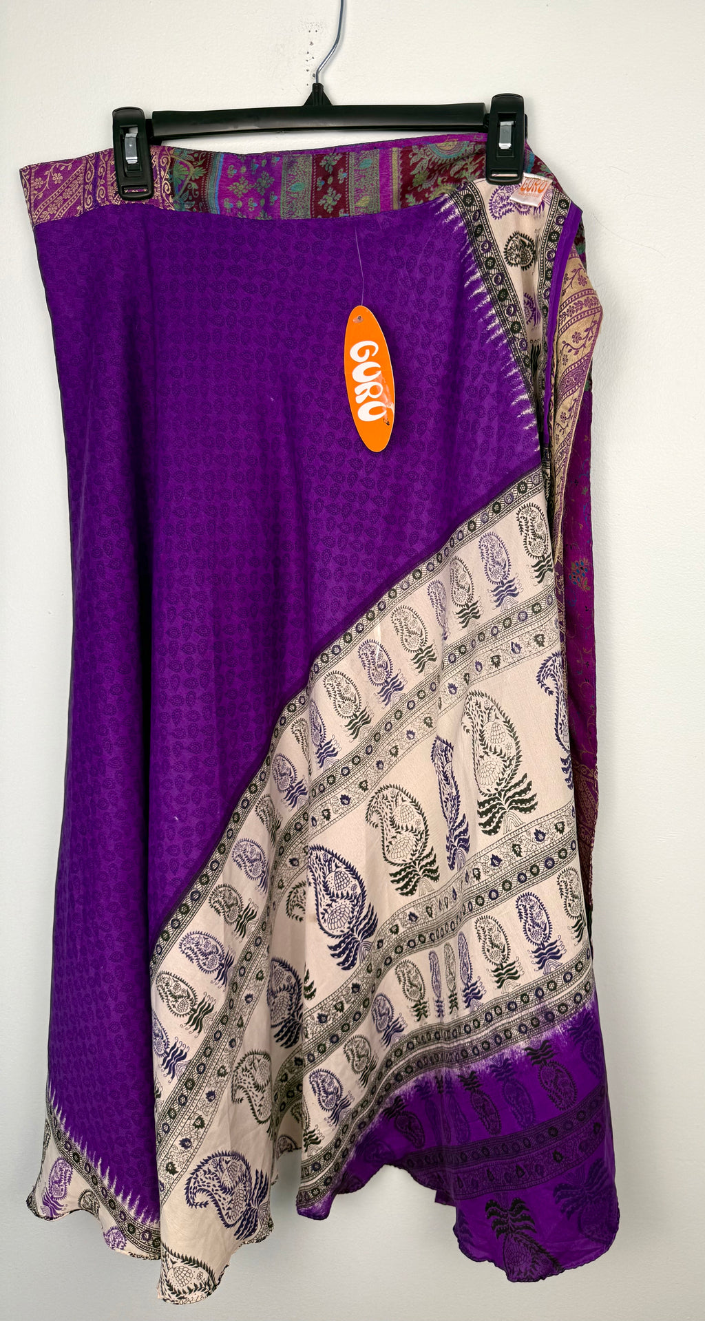 100% Silk Wrap Skirt | NWT Reversible Sari Skirt | Handmade in India at Blue Sparrow Shop on hanger showing new tag