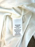 100 percent viscose outer tunic white sleeveless layering blouse care tag detail