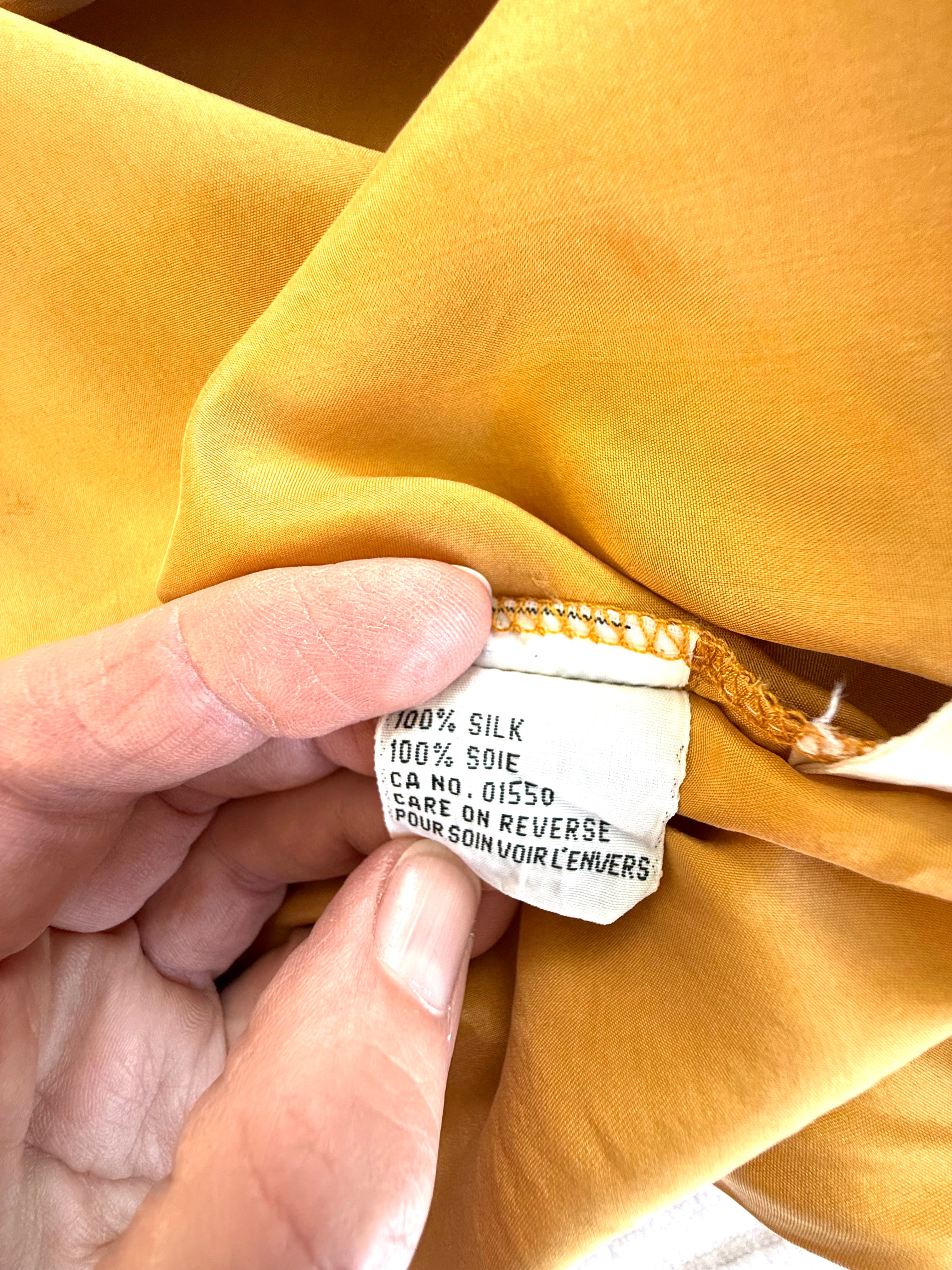 100% silk inside label on 100% Silk Vintage Dalmys Classic Shell Tank | Size M at Blue Sparrow Shop  