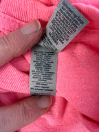 50% cotton inside tag on Yellowstone Fan Graphic Tee in Pink | Size S at Blue Sparrow Shop Canadian Resale 