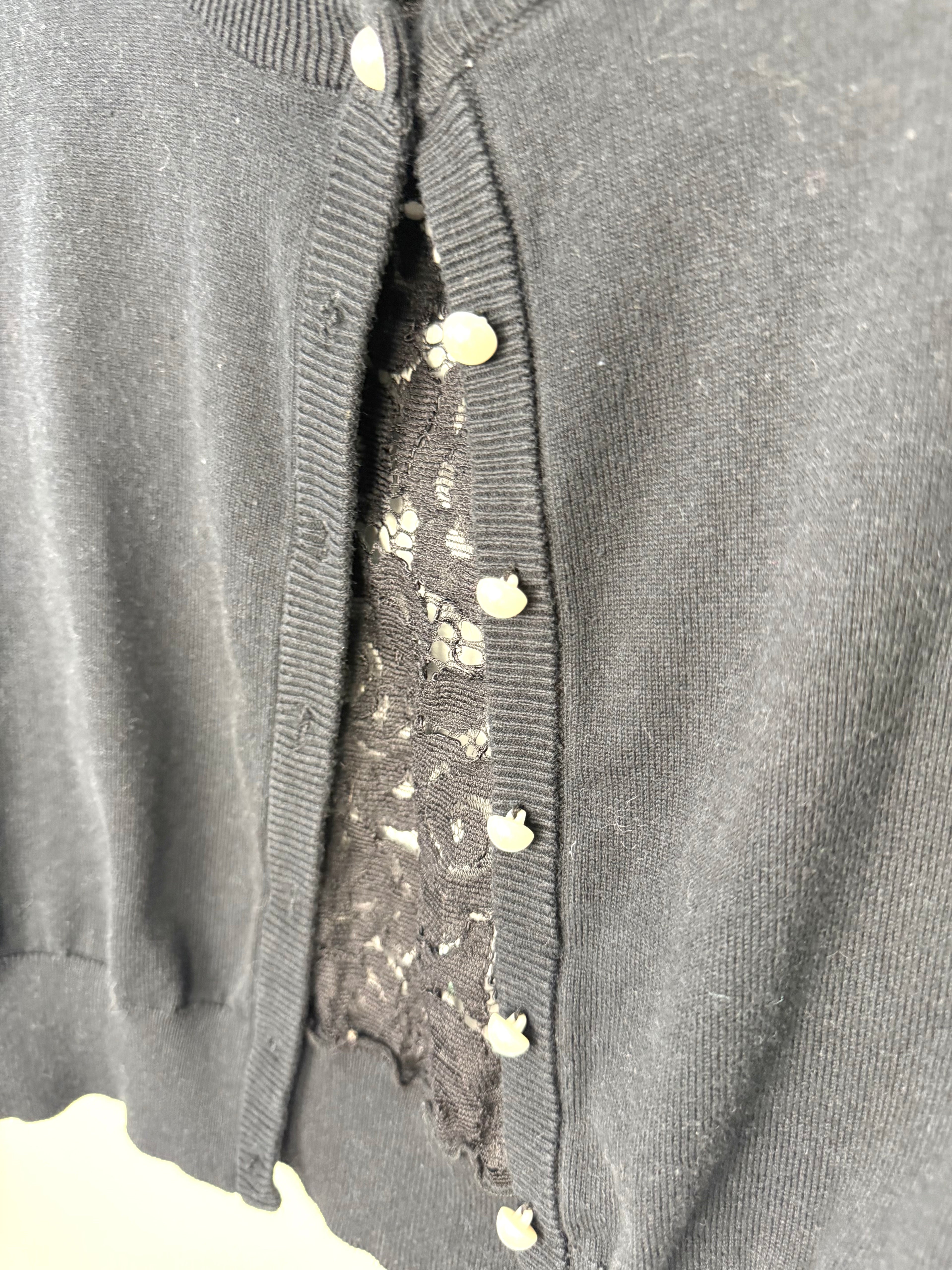 60's style Karl Lagerfeld Paris black knit cardigan front view up close detail of buttons