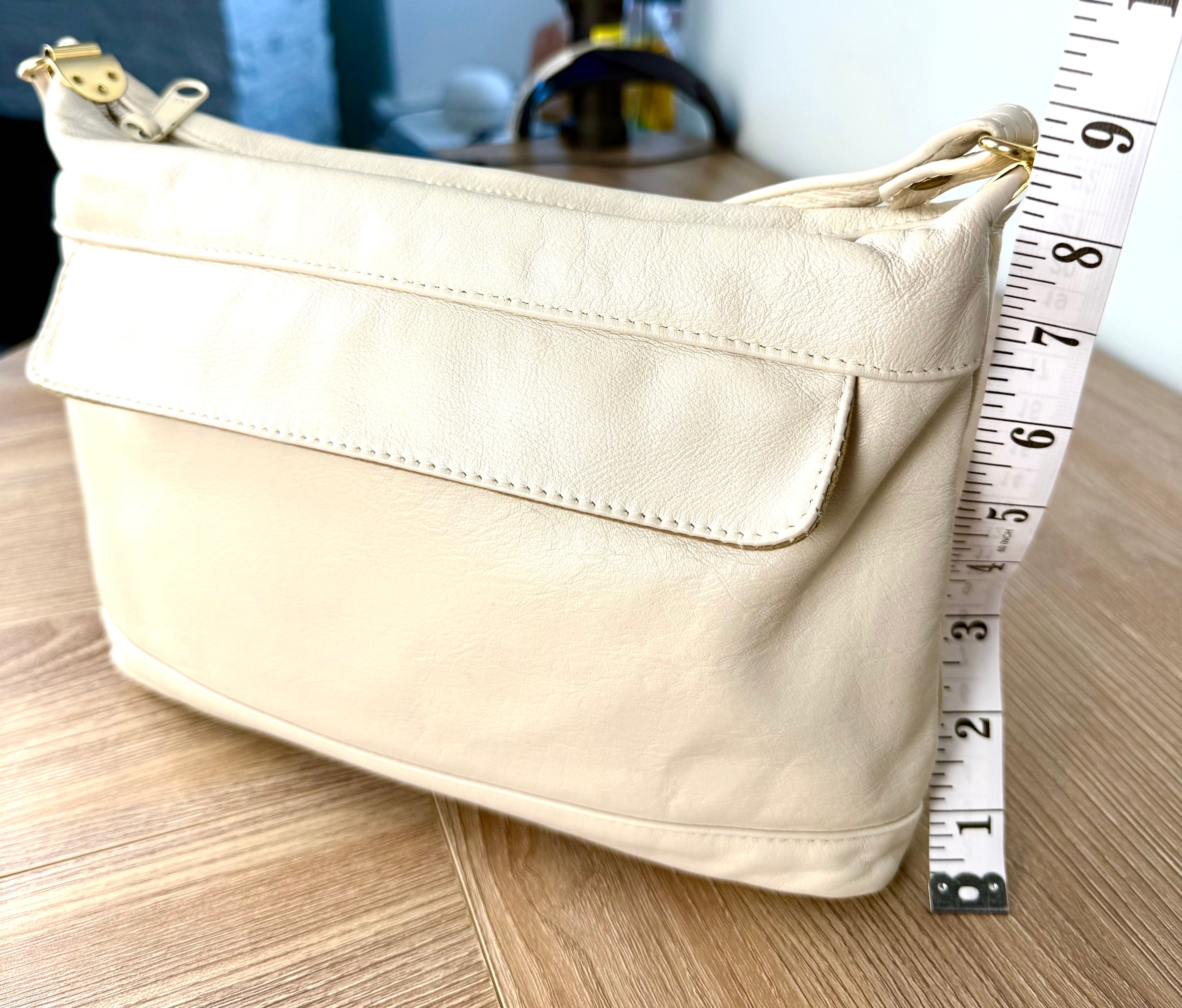 80's leather bag by Brixton Canada Made in Vancouver measuring 9" tall 