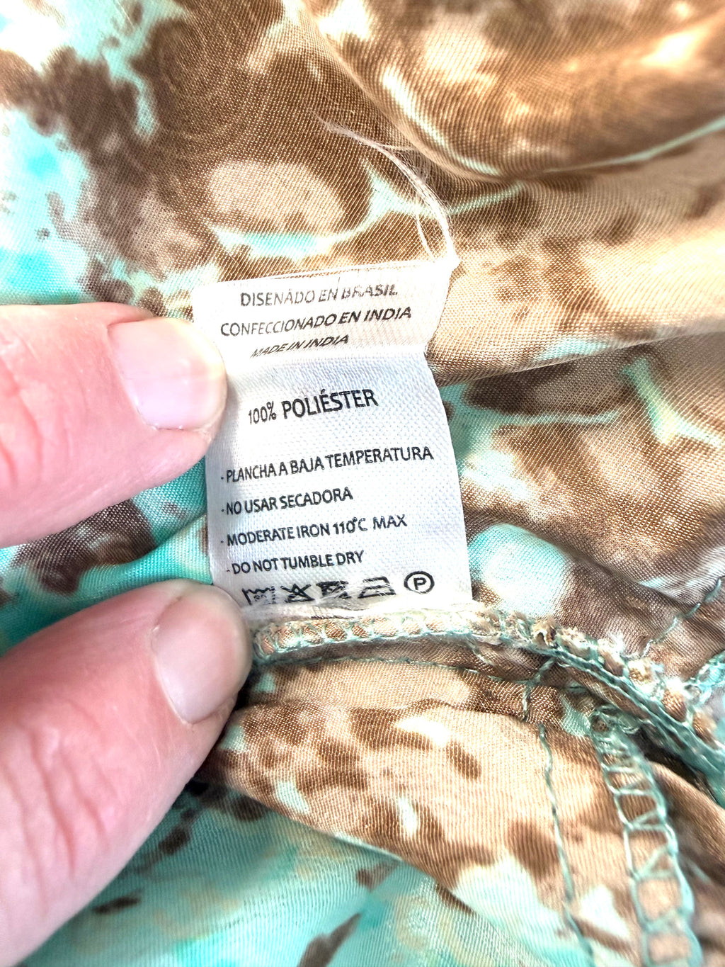 AMORas  smocked festival dress inside care tag 100% polyester