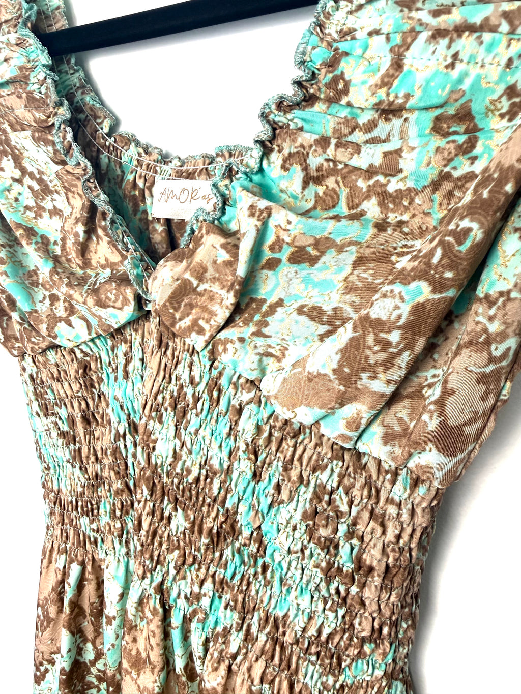 AMORas turquoise and brown printed smocked midi dress close up of smocked area on boho summer festival dress