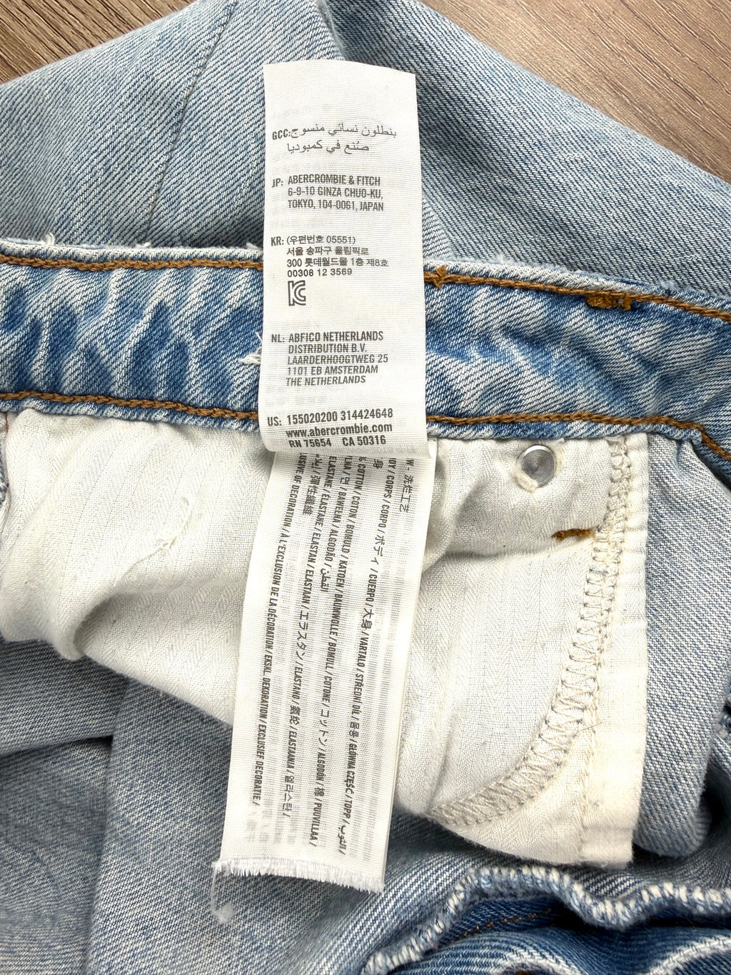Abercrombie & Fitch Curve Love high rise mom jeans light wash distressed denim  care tag