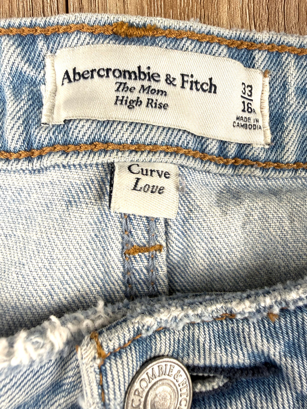 Abercrombie & Fitch Curve Love high rise mom jeans light wash distressed denim  inside label 