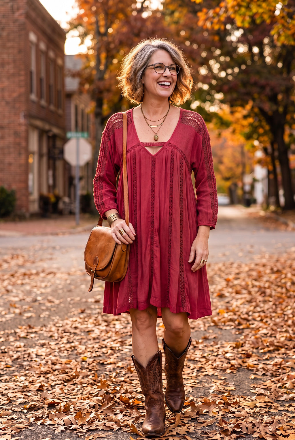 ai generated Woman walking in fall leaves wearing red tunic dress and cowboy boots