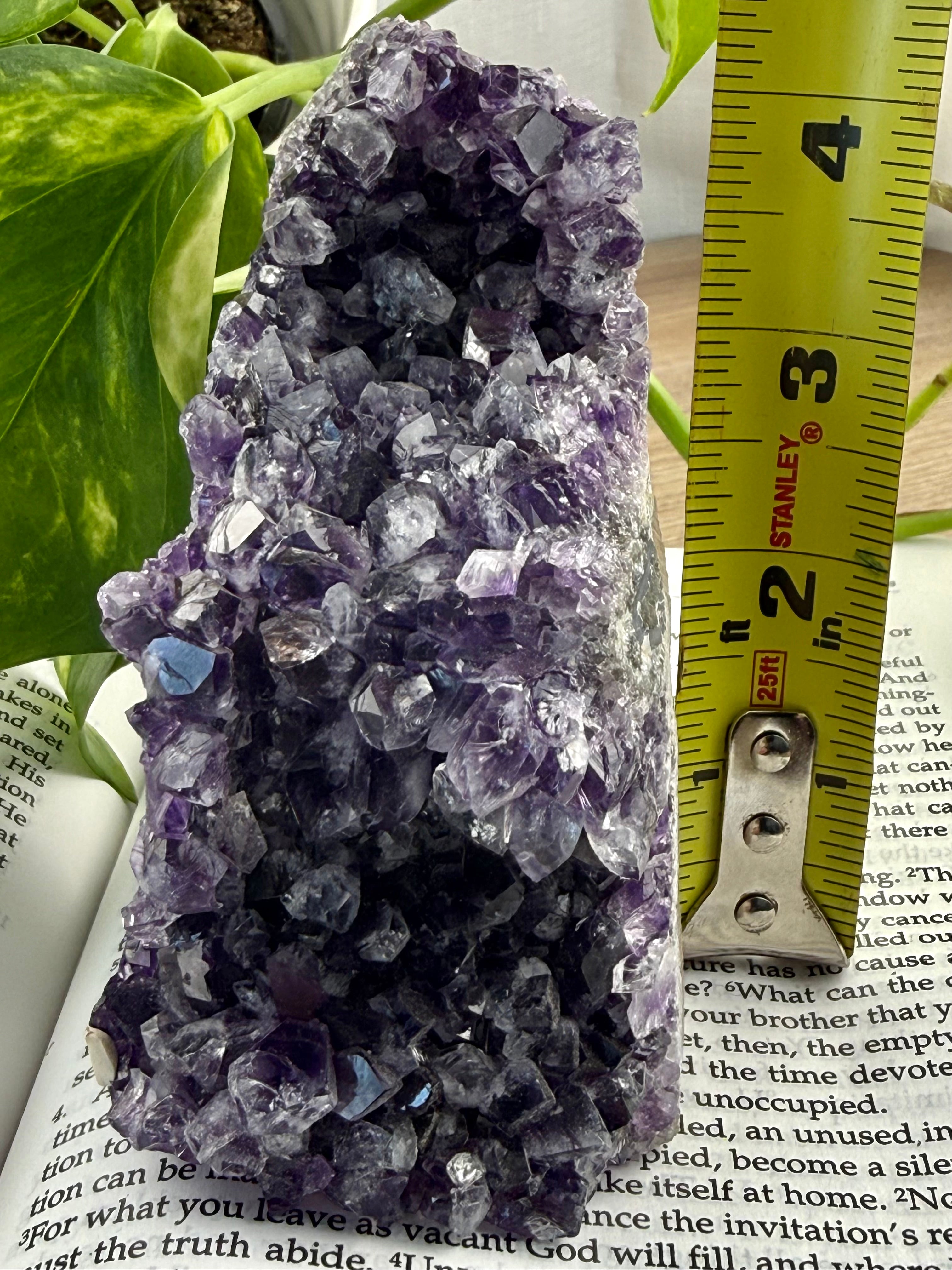 Amethyst Cathedral with measuring tape showing it 4 inches tall
