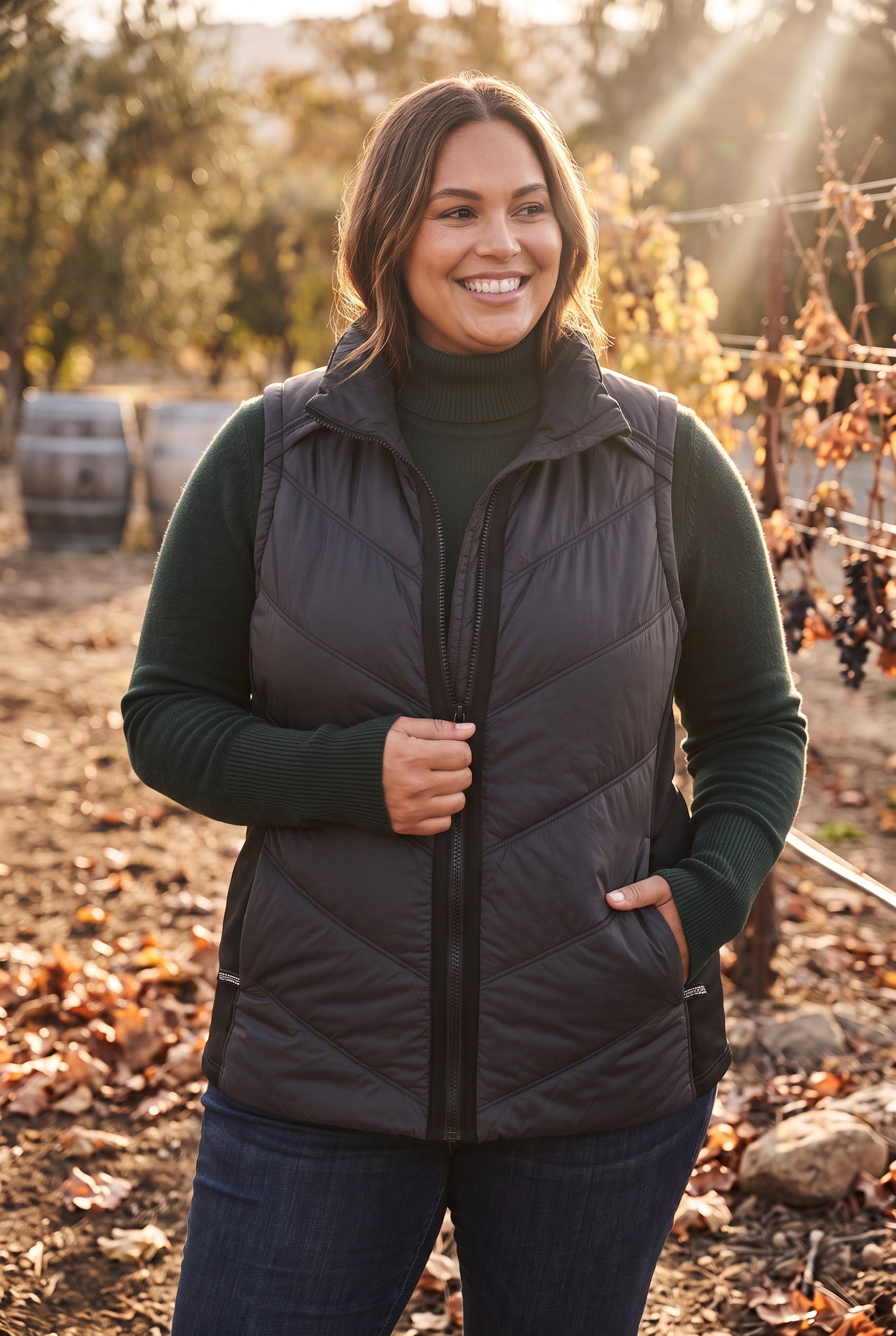 Athleta Rock Ridge PrimaLoft Insulated Vest in Black | Size 2X on woman outside in fall 