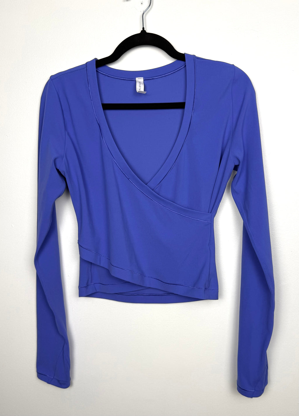 Athleta blue wrap front cropped long sleeve yoga top