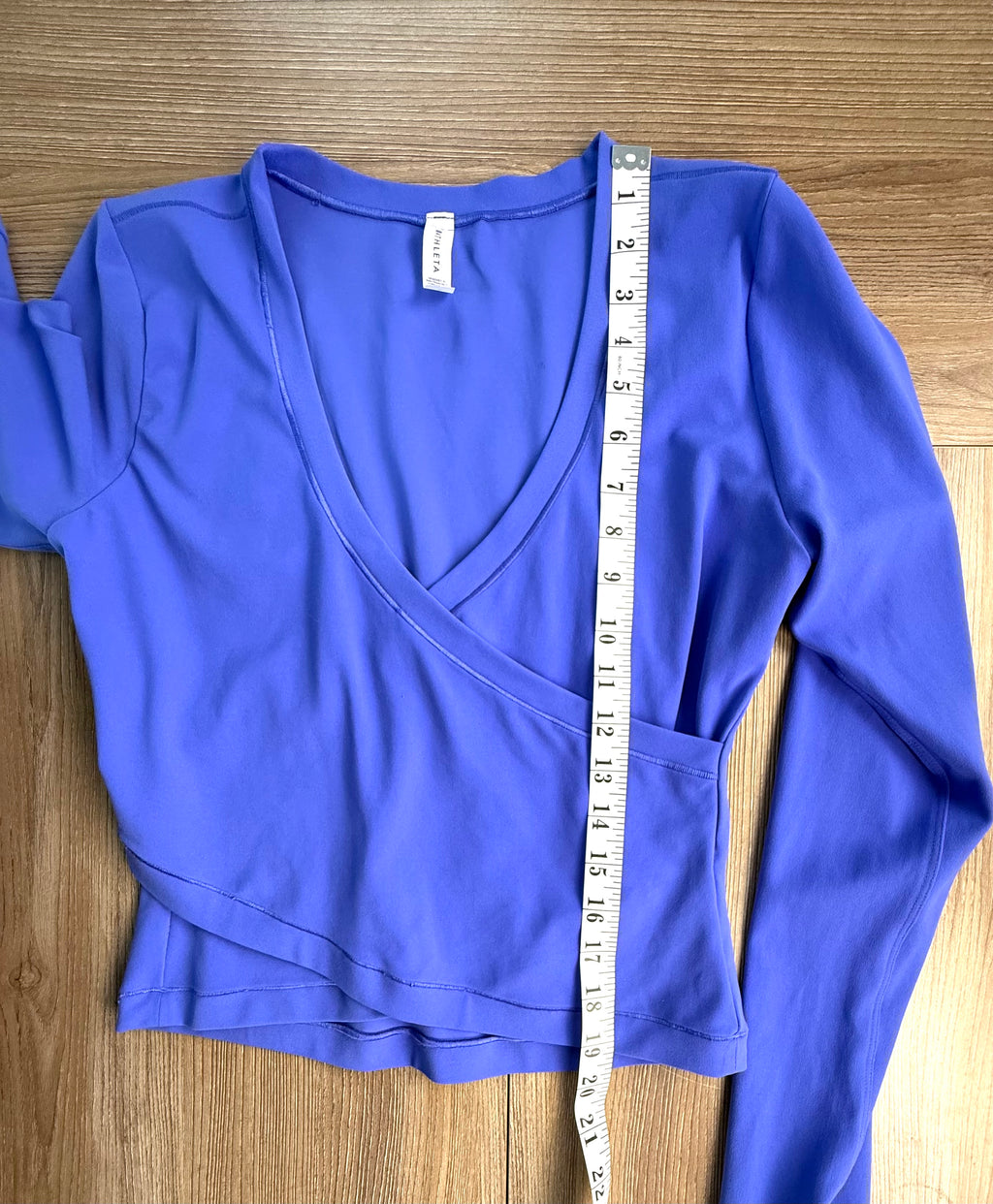 Athleta crop top in periwinkle blue measuring 19"from shoulder to hem