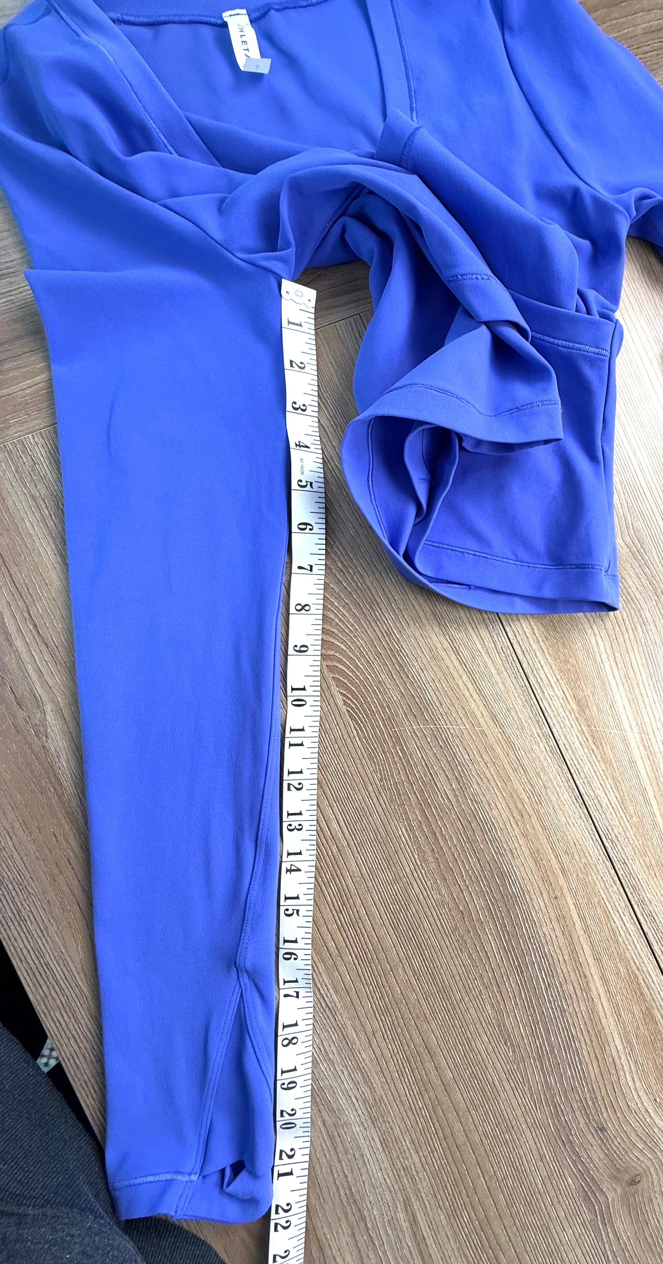 Athleta crop top in periwinkle blue measuring 22" sleeve length