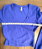Athleta crop top in periwinkle blue measuring 34" bust