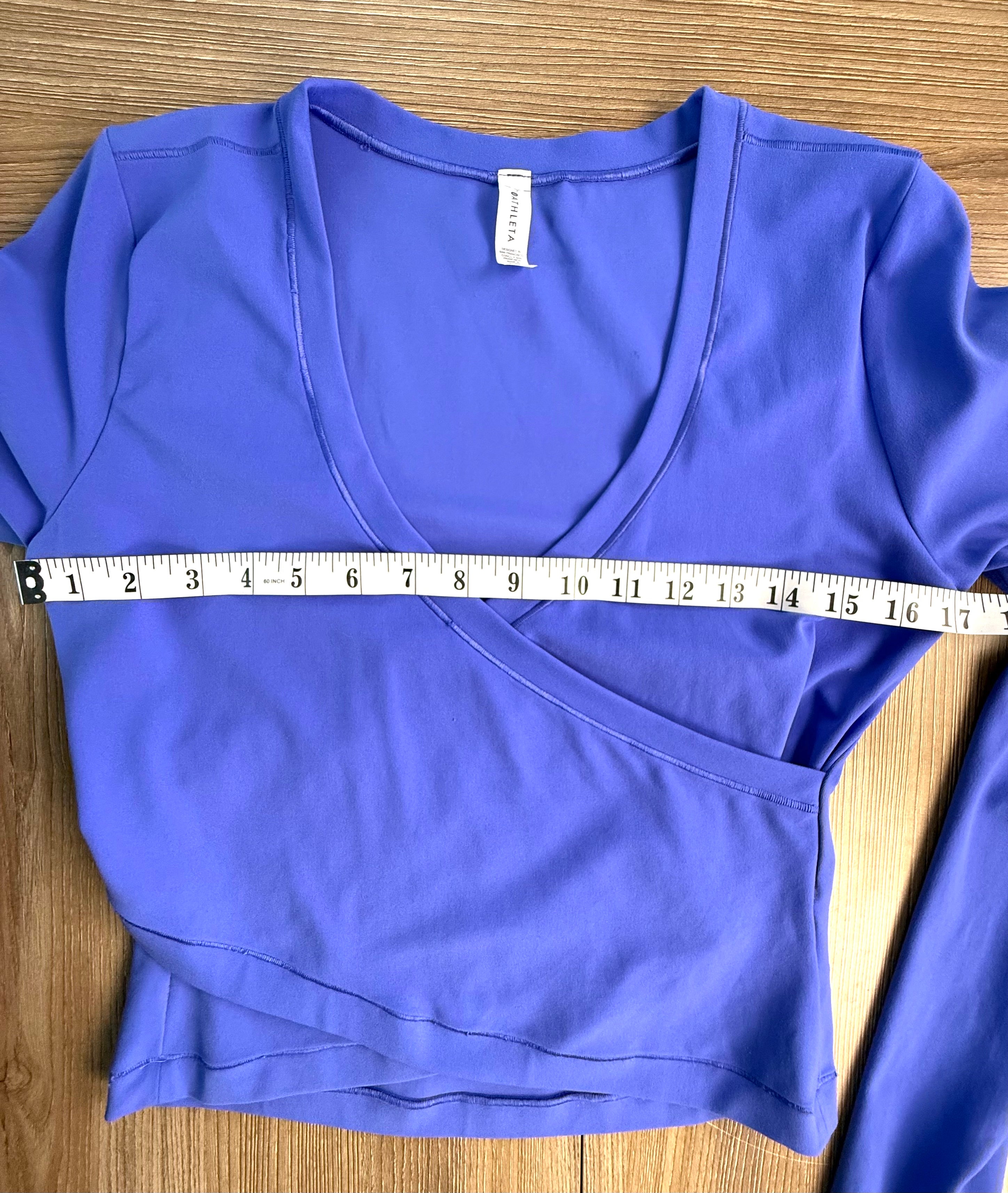 Athleta crop top in periwinkle blue measuring 34" bust