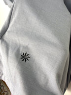 Athleta logo on back of Grey Athleta Vital Tank 2.0 sleeveless top, lightweight performance fabric, minimalist athletic layering piece