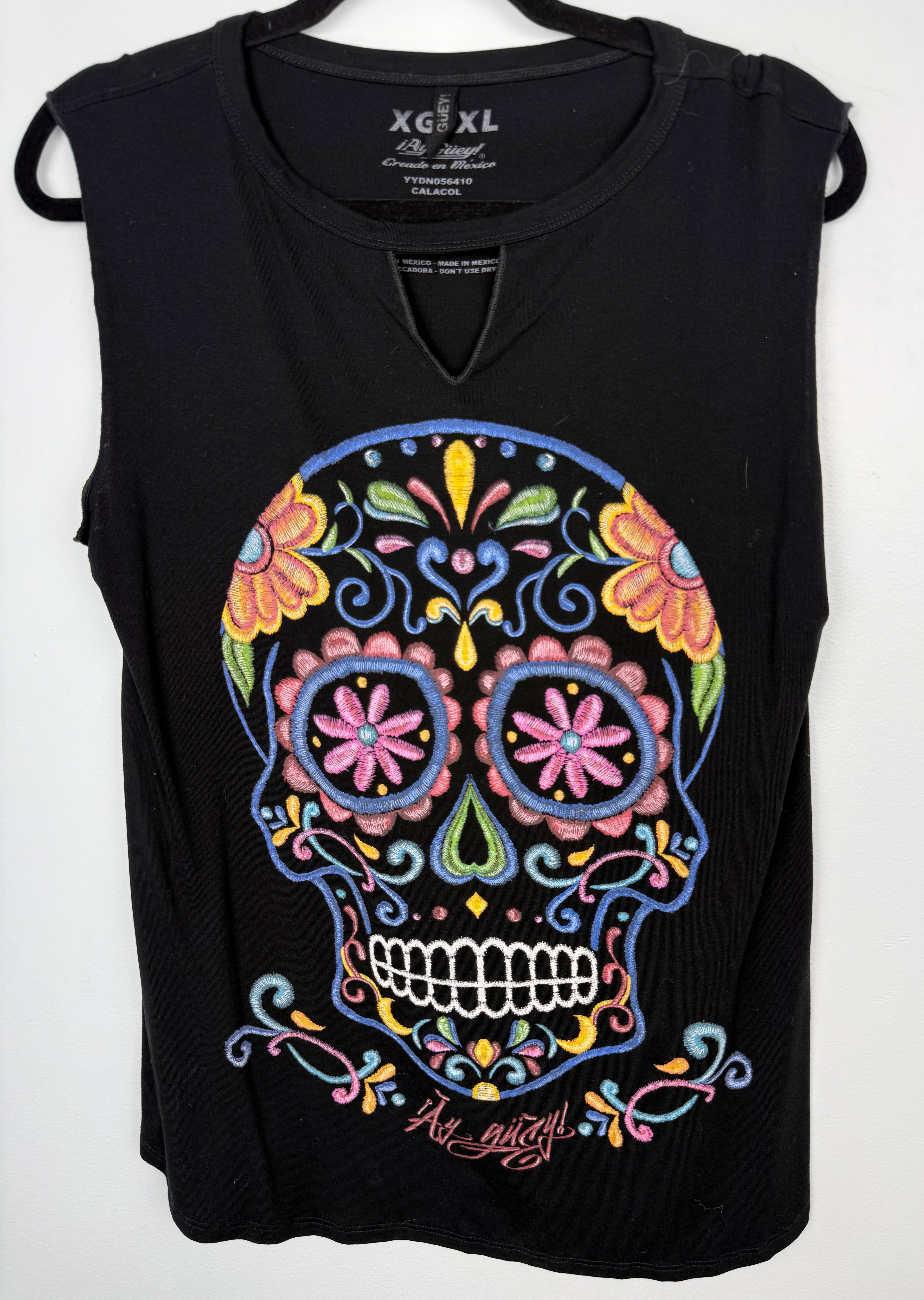 ¡Ay Güey! black sleeveless sugar skull embroidered tank top, Día de los Muertos multicolour embroidery at Blue Sparrow Shop on hanger