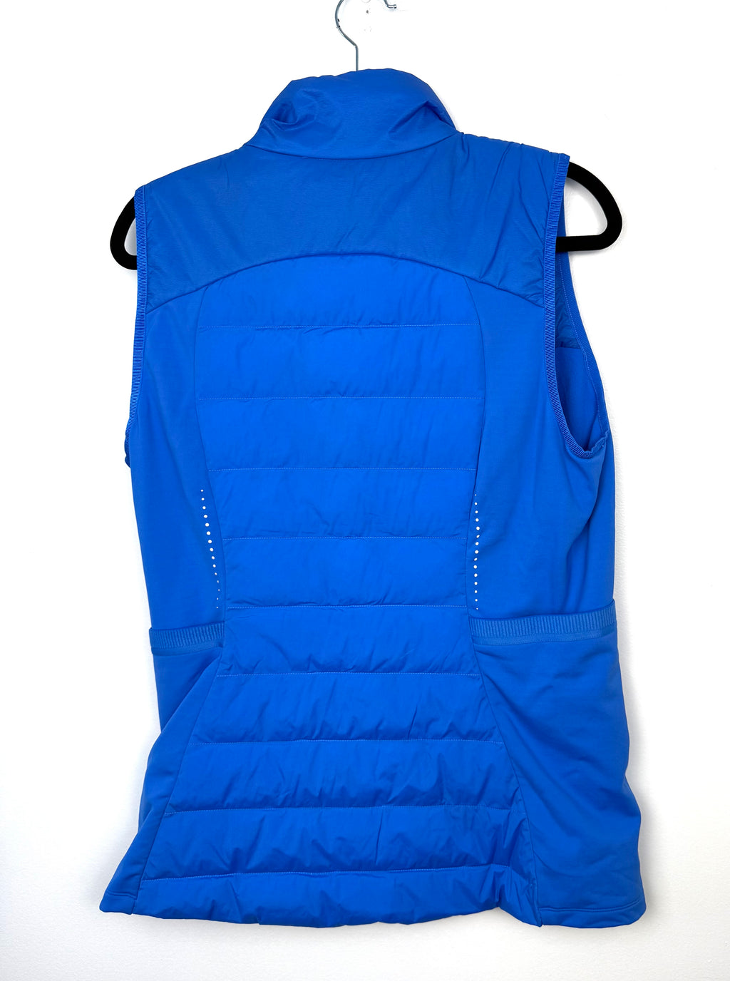 Back view Lululemon blue puffer vest lightweight insulated athleisure jacket.