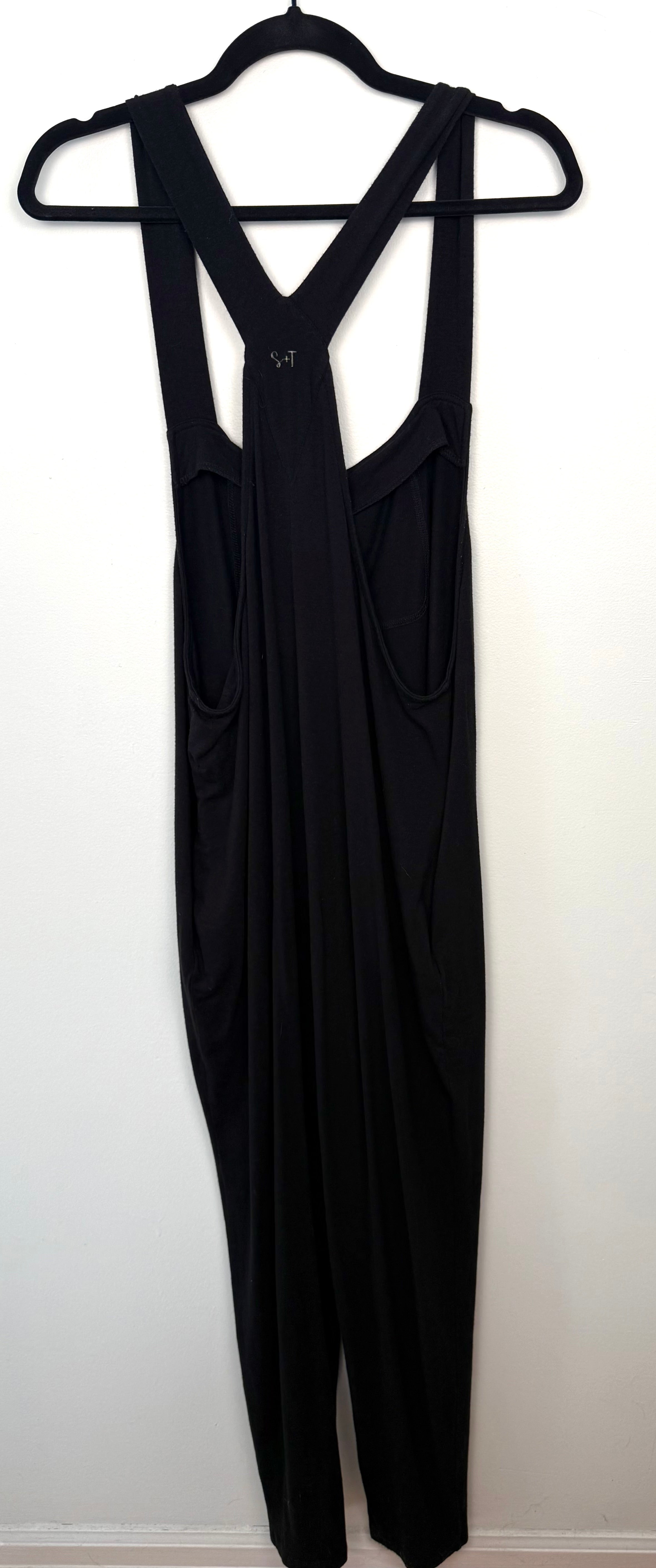 Back view Smash & Tess Jumpsuit showing wide shoulder straps and relaxed silhouette.
