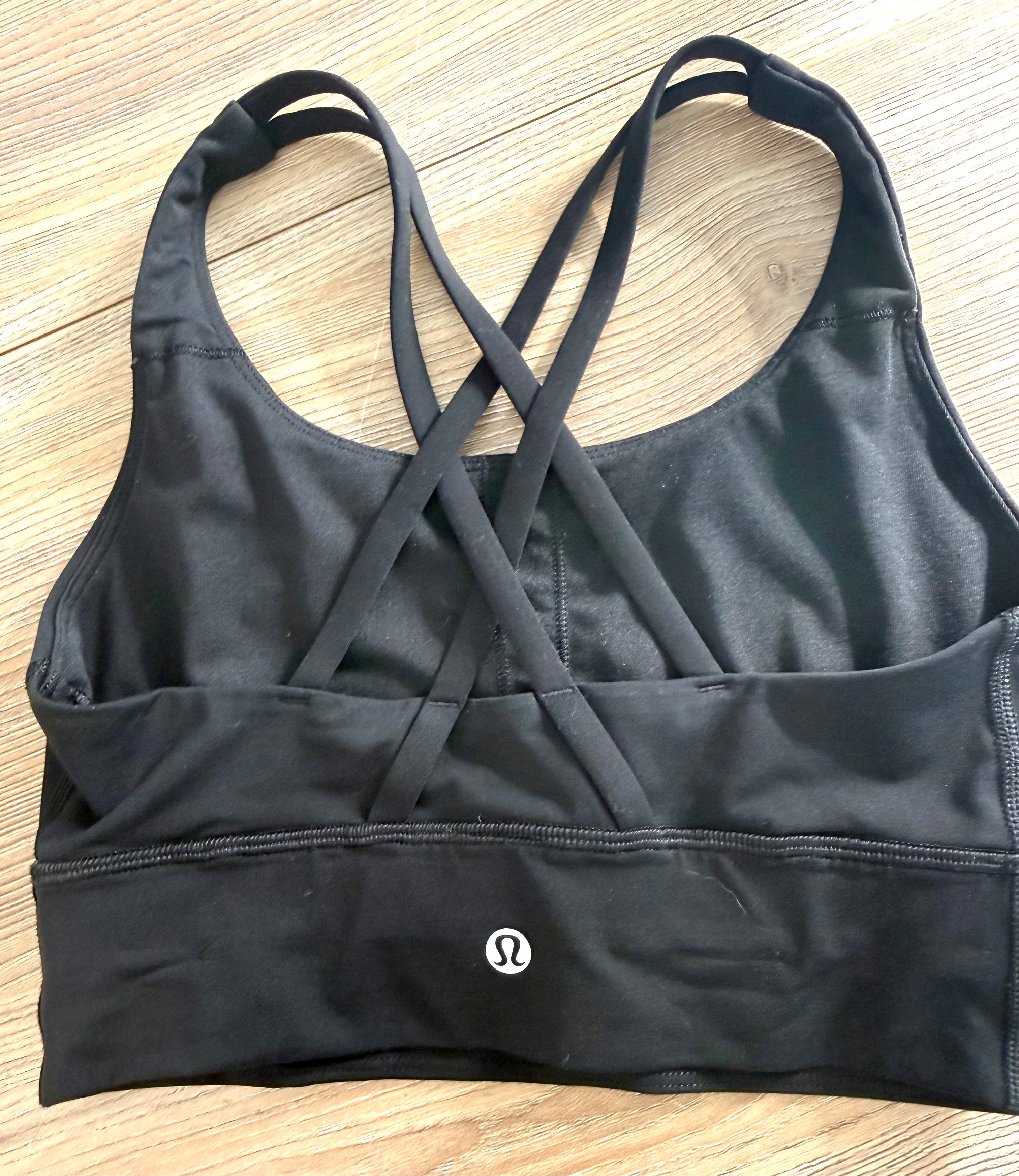 Back view featuring signature criss-cross strappy design with Lululemon logo on lower band.