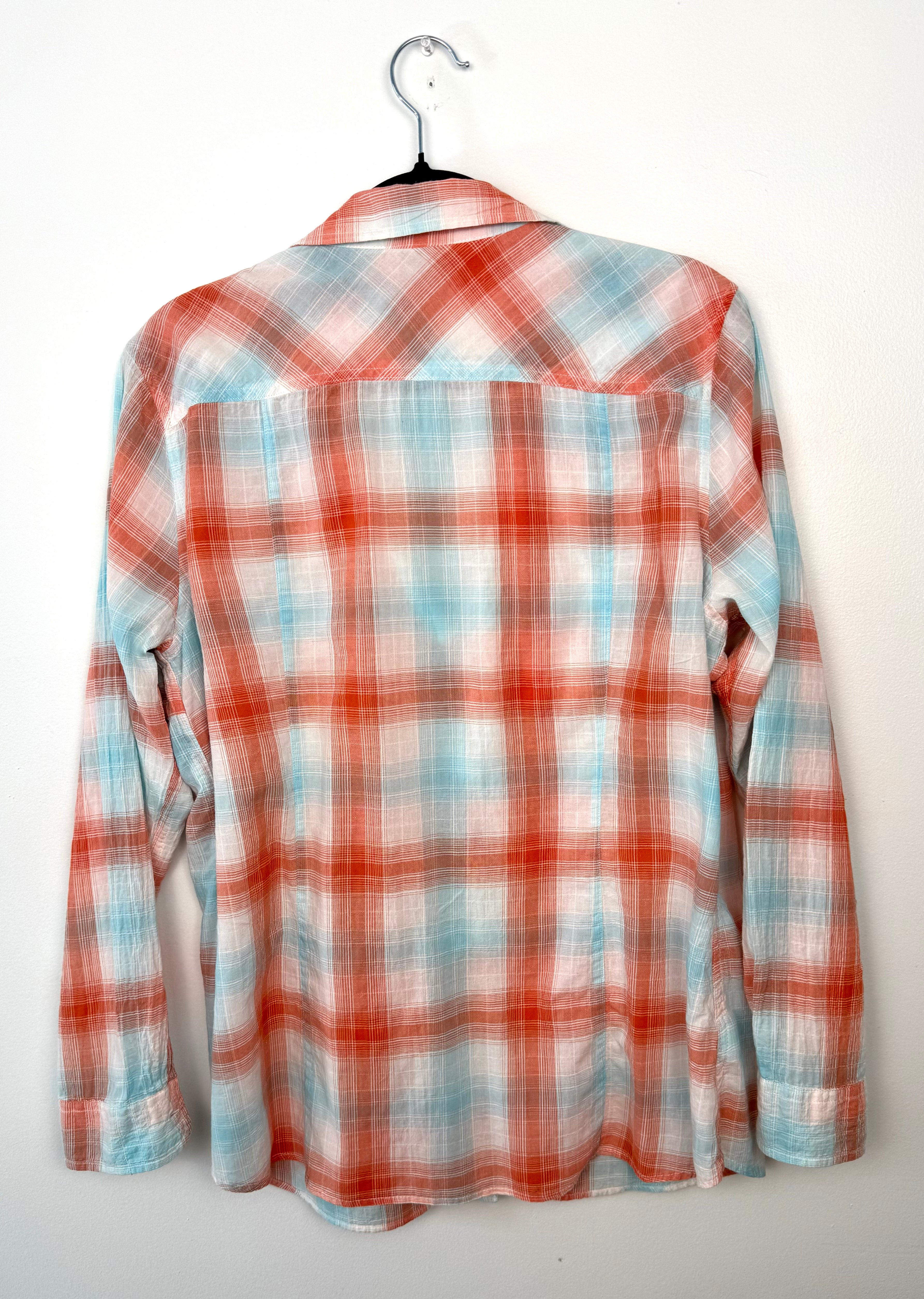 Back view of Eddie Bauer coral and aqua plaid shirt, women’s XL classic fit, lightweight cotton blend with curved hem.