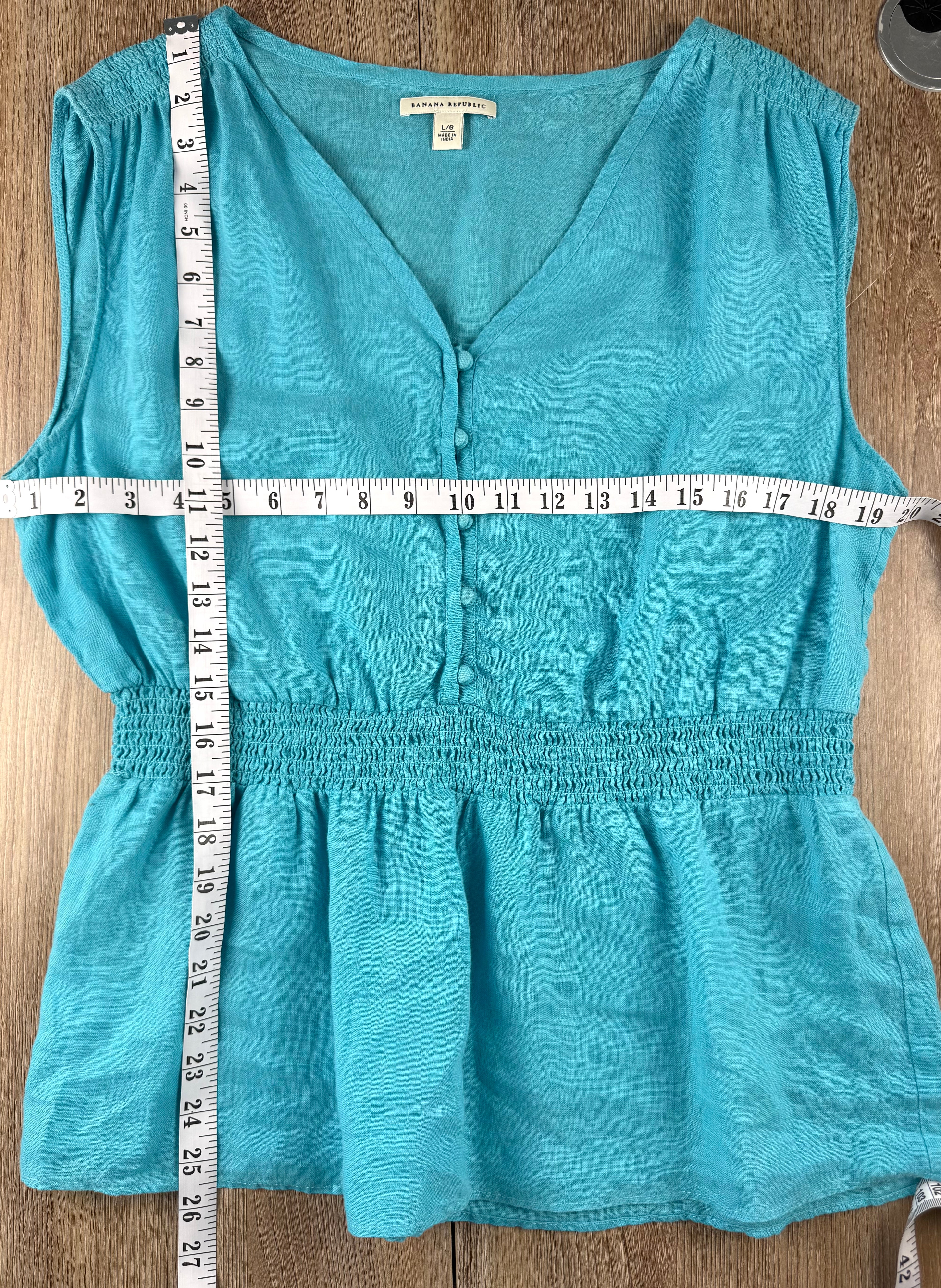 Banana Republic 100% Linen Smocked Waist V-Neck Blouse Aqua Coloured | Size L at Blue Sparrow Shop Canadian Resale Reimagined  measuring 40" bust and 26" shoulder to hem 
