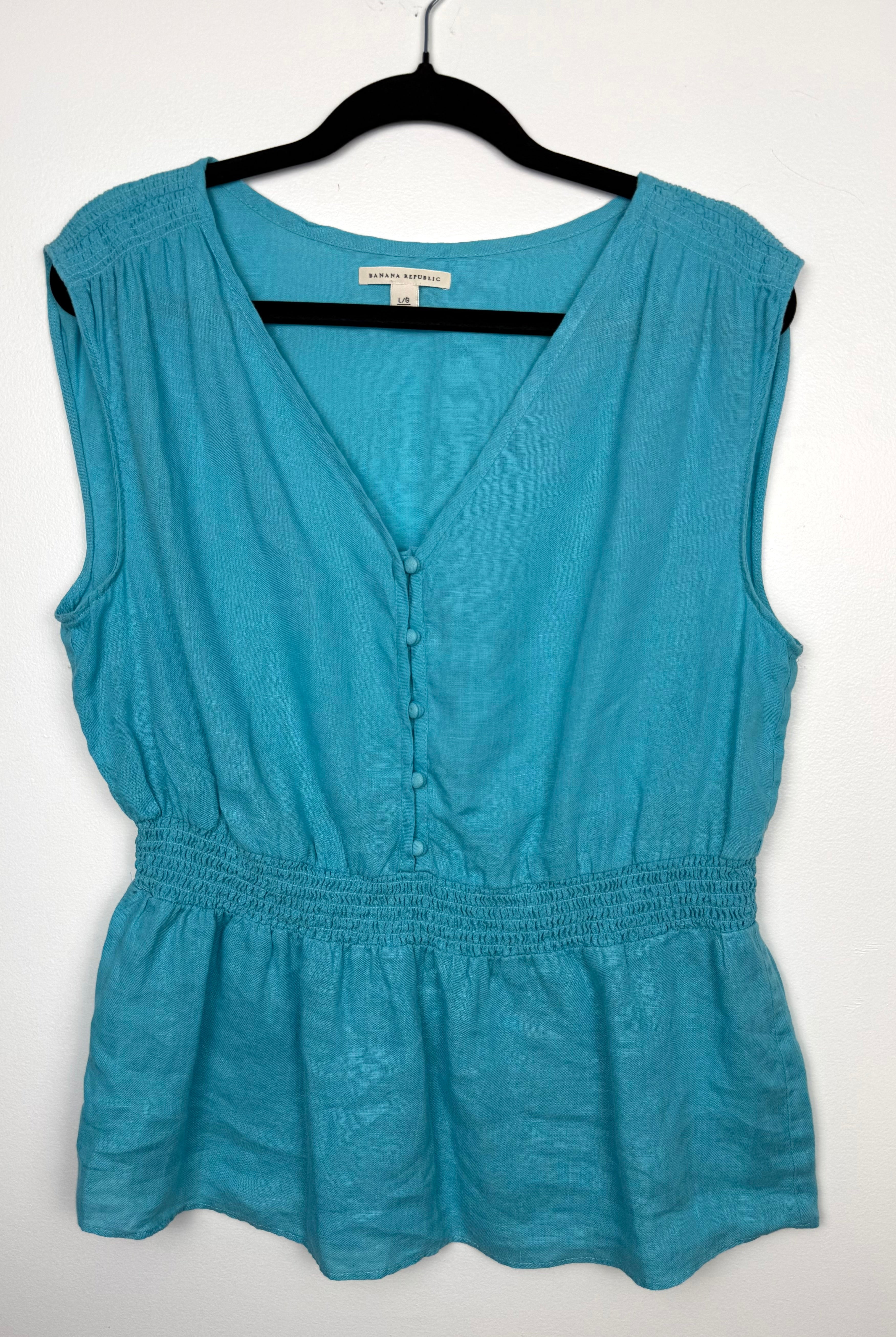 Banana Republic 100% Linen Smocked Waist V-Neck Blouse Aqua Coloured | Size L at Blue Sparrow Shop Canadian Resale Reimagined  on hanger