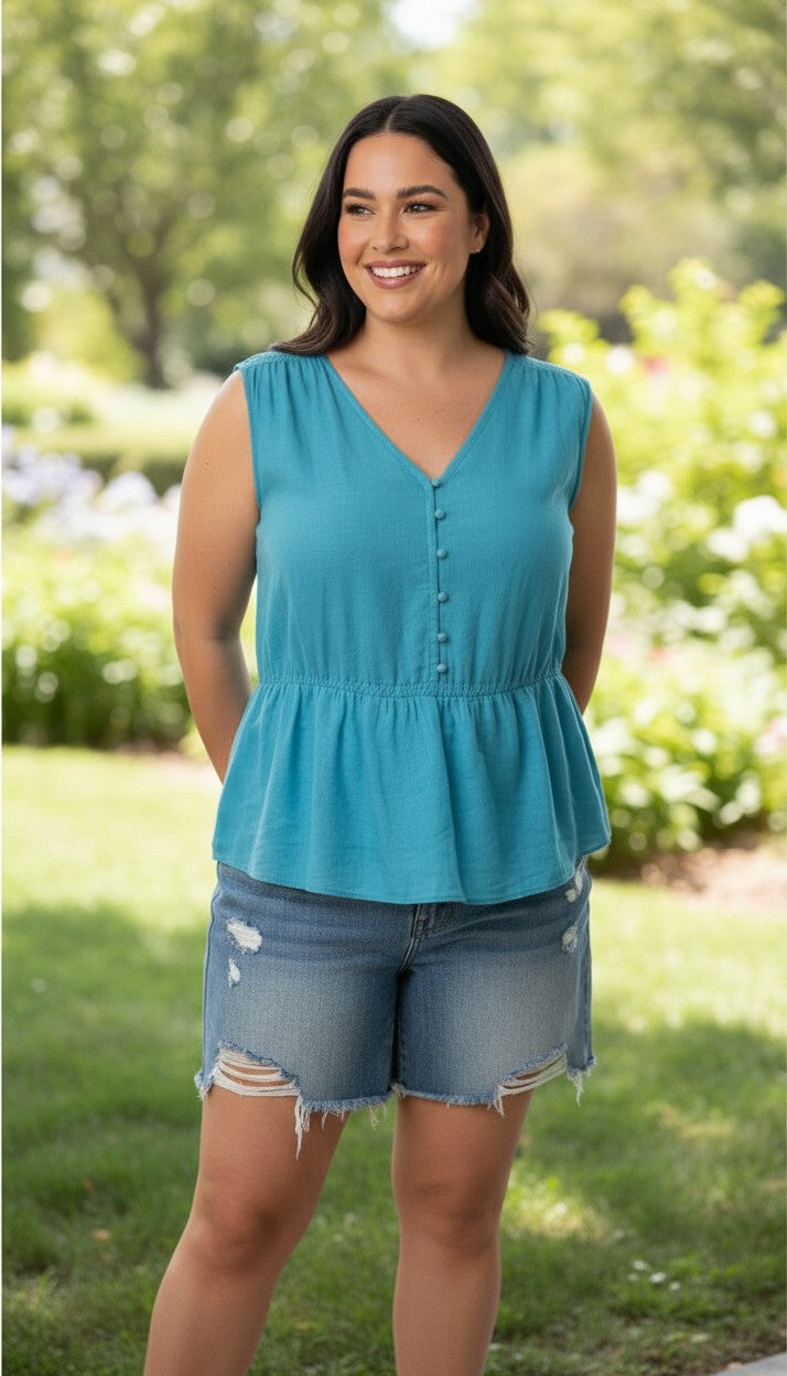 Banana Republic 100% Linen Smocked Waist V-Neck Blouse Aqua Coloured | Size L at Blue Sparrow Shop Canadian Resale Reimagined  on woman outside 