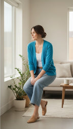 Banana Republic Fitted Cardigan | Size L  at Blue Sparrow Shop on woman sitting on edge of couch 