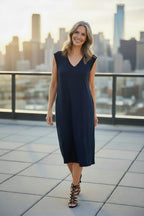 Banana Republic Navy Sleeveless Midi Dress | T-Shirt Dress | Size L at Blue Sparrow Shop on woman outside wearing strappy high heel sandals