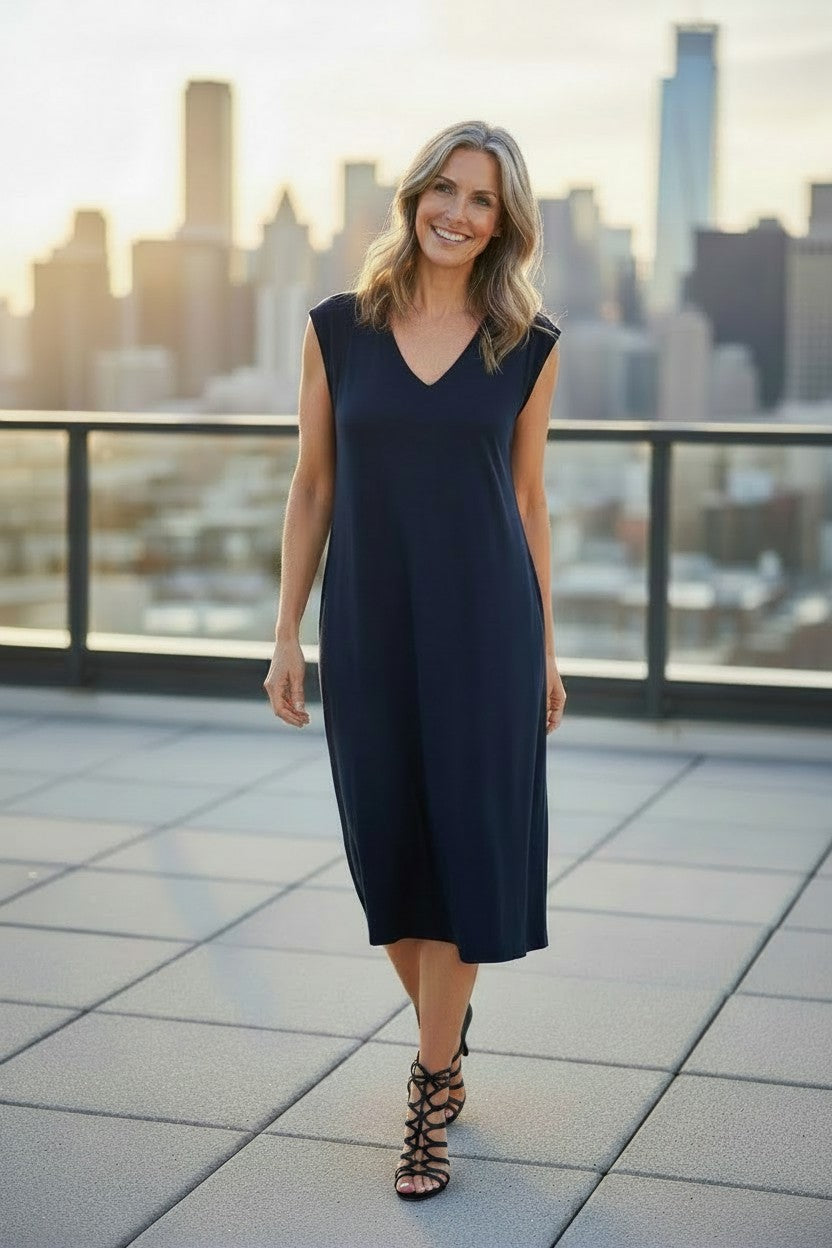 Banana Republic Navy Sleeveless Midi Dress | T-Shirt Dress | Size L at Blue Sparrow Shop on woman outside wearing strappy high heel sandals
