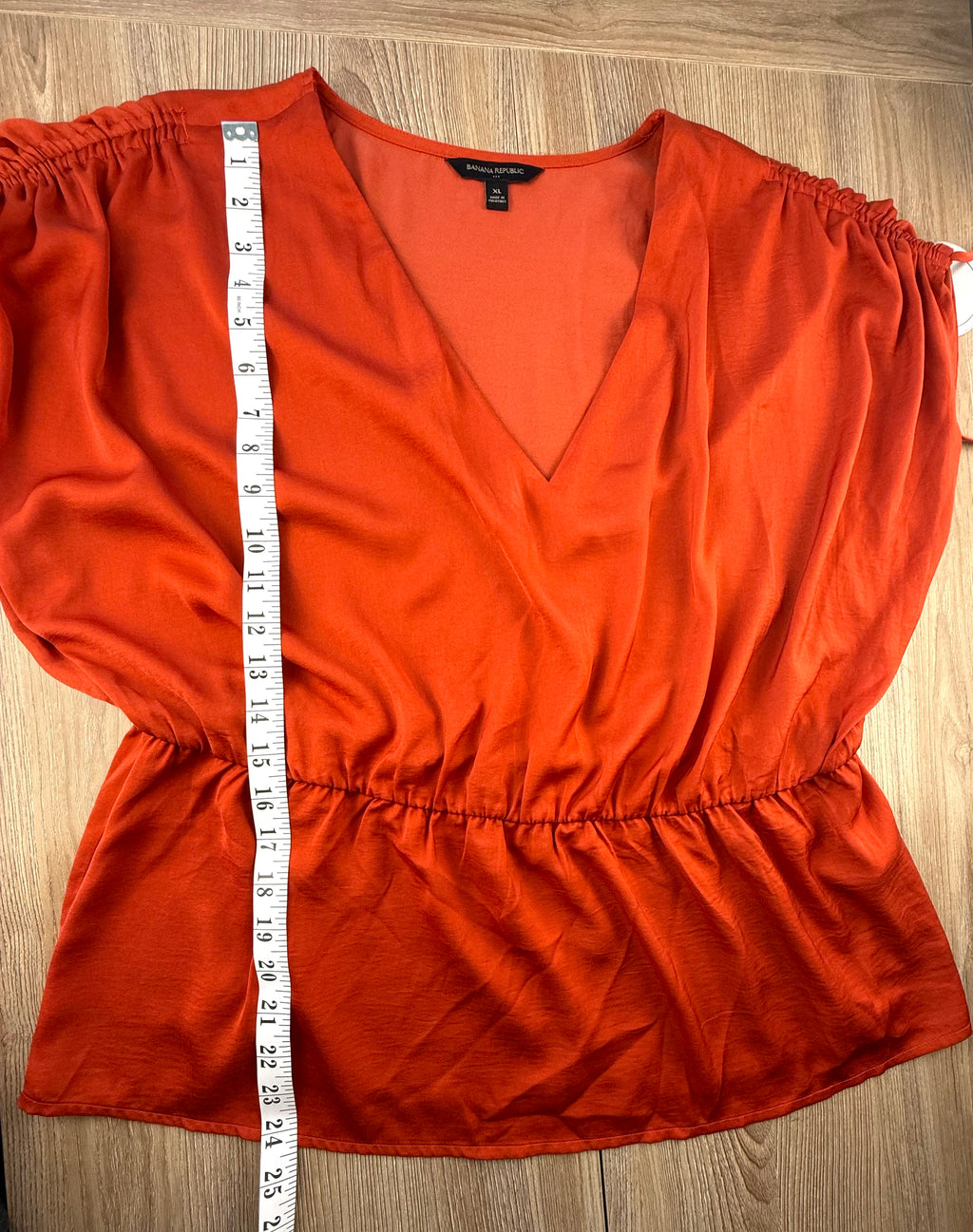 Banana Republic Peplum Waist top measuring 24" shoulder to hem 