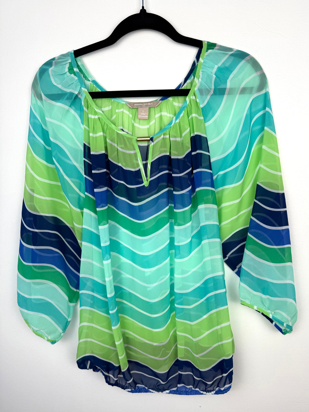 Banana Republic Sheer lightweight chiffon fabric blouse  on hanger