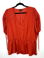 Banana Republic ruched sleeve peplum top in rust  on hanger