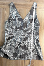 Banana Republic top sleeveless top with peplum waist measuring 28" from shoulder to hem