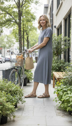 Birkenstock Toe Loop Sandals | Size 39 at Blue Sparrow Shop on woman holding a bike 