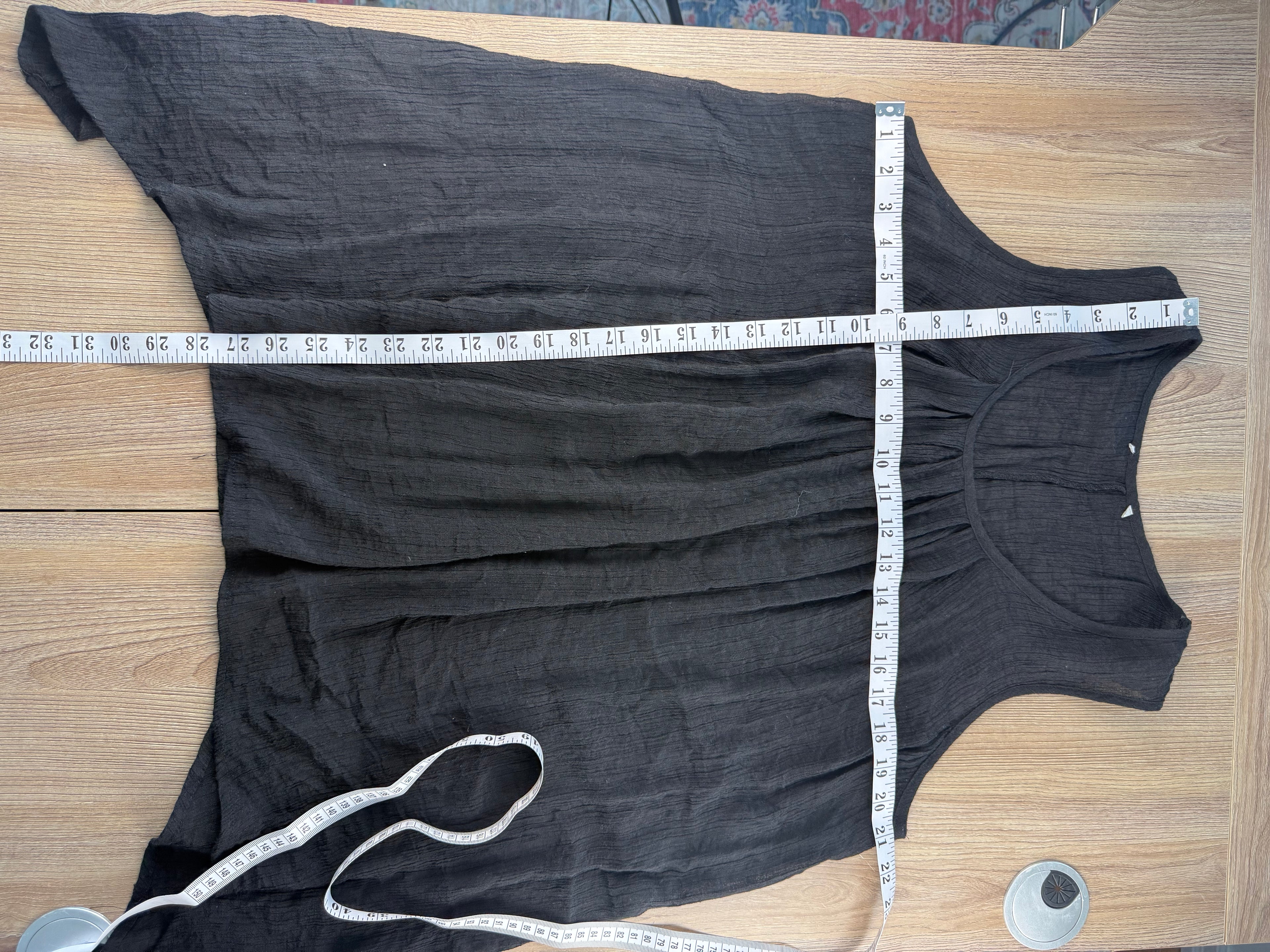 Black Gauze Sleeveless Tunic Swim Cover or Resort Wear top measuring 28" shortest 32" longest and 42" bust