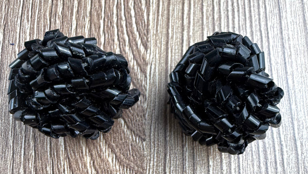 Black Tube Bead Cluster Dome Stud Earrings on table