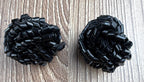Black Tube Bead Cluster Dome Stud Earrings on table