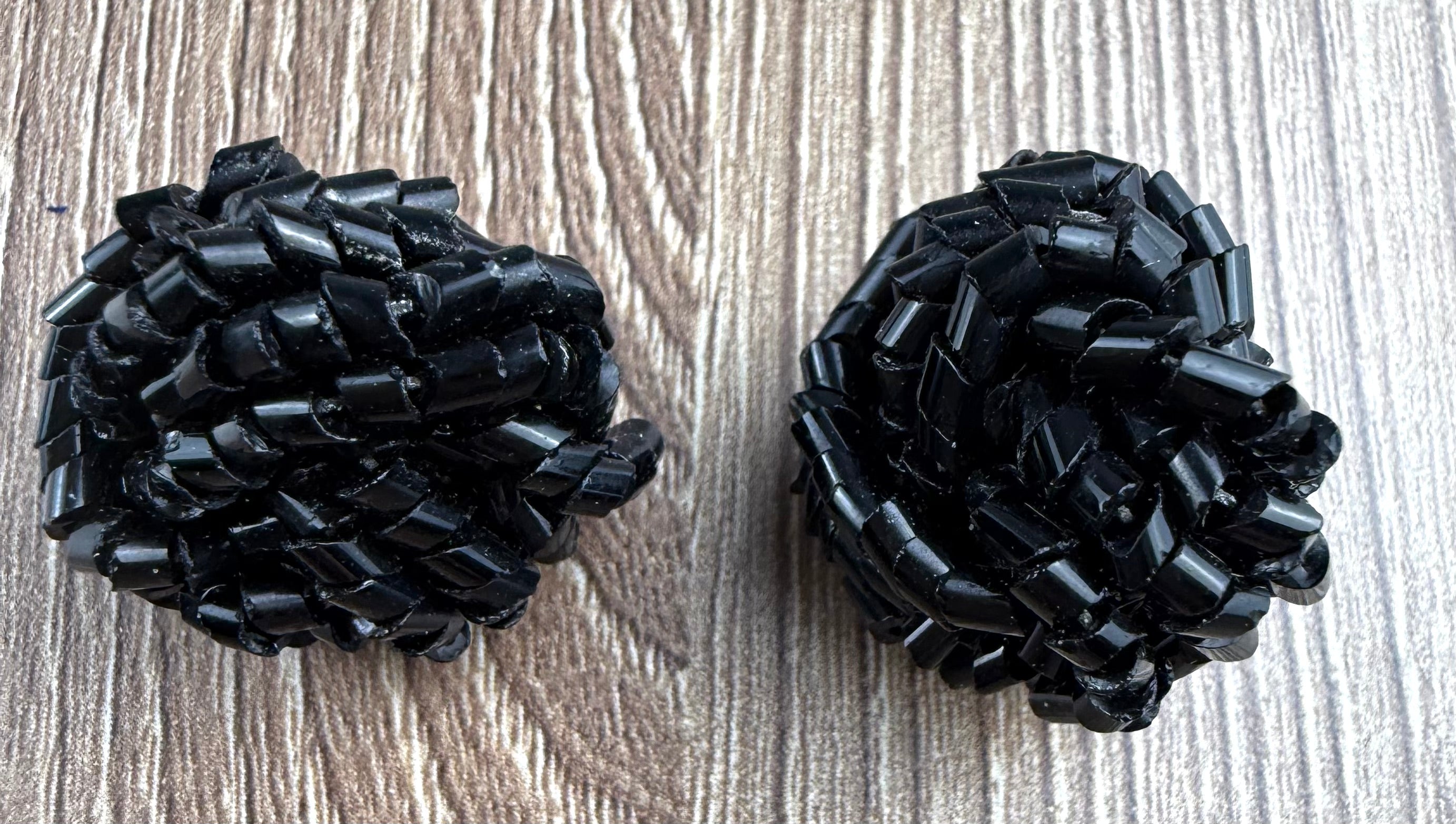 Black Tube Bead Cluster Dome Stud Earrings on table
