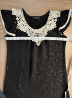 Black sequinned top with crochet lace collar measuring 34" bust