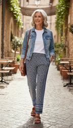 Boho Medallion Print Wide-Leg Palazzo Pants | Size M at Blue Sparrow Shop on woman wearing jean jacket walking outside 