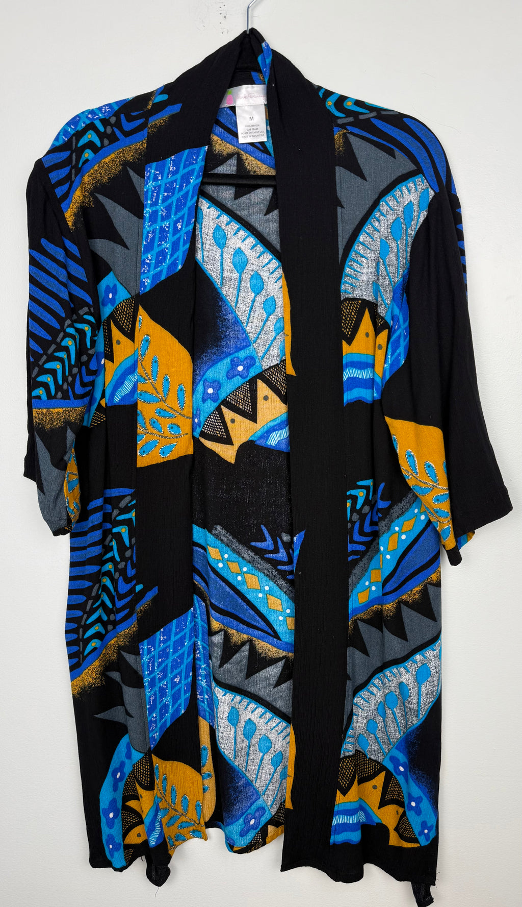 Bold Geometric Print Open Kimono Cardigan | Size M at Blue Sparrow Shop on hanger