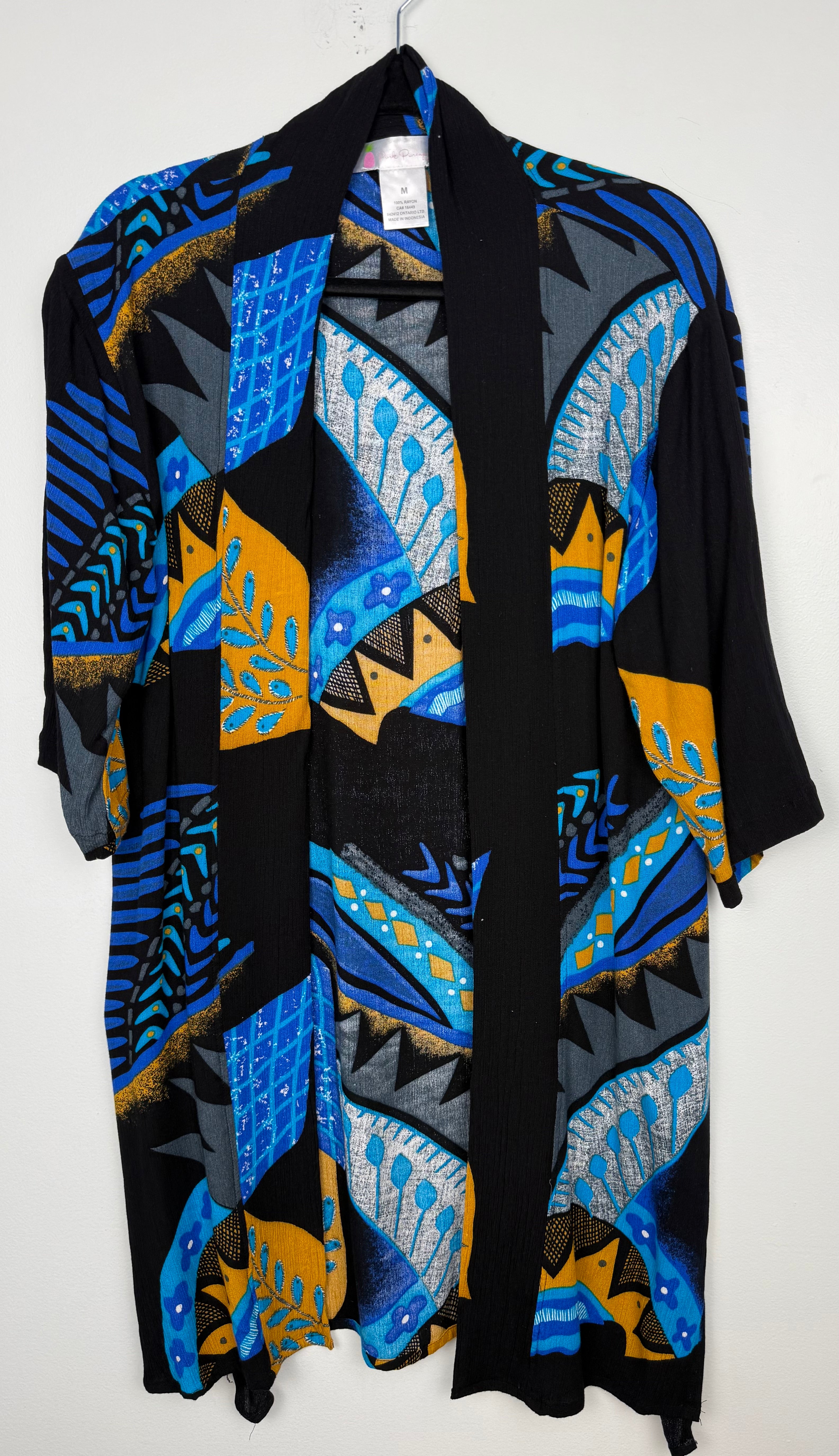 Bold Geometric Print Open Kimono Cardigan | Size M at Blue Sparrow Shop on hanger